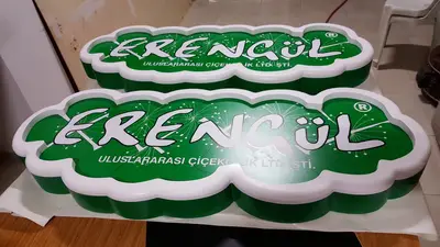 Erengül Çiçekçilik — mall kiosk — white laminate panels, green (production)