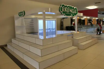 Erengül Çiçekçilik — mall kiosk — crown signage above the unit, backlit sign (the unit installed in place)