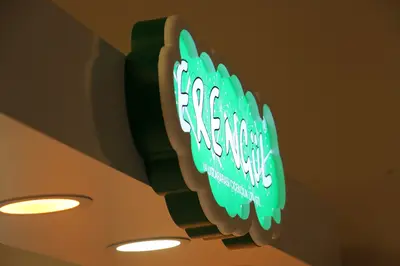 Erengül Çiçekçilik — mall kiosk — painted MDF, backlit sign (both in the workshop and on site)