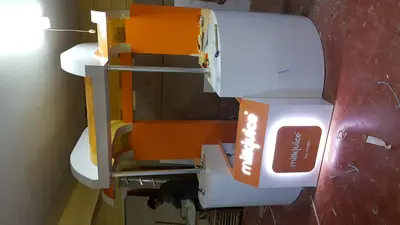 Milk Juice — fuar standı — paslanmaz çelik, turuncu (üretim)