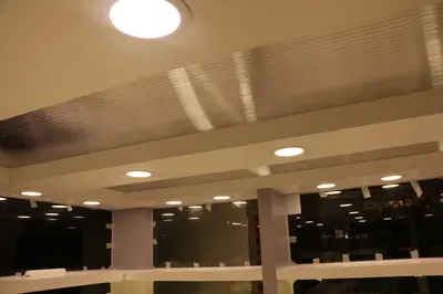 May Gift Shop — mall kiosk — tempered glass display cases, white (on-site assembly)