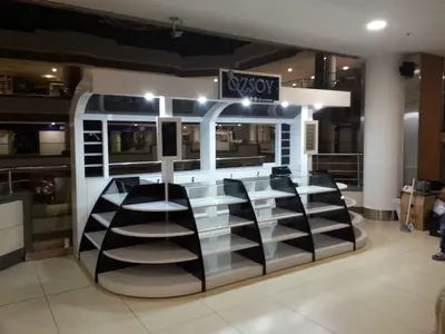 Özsoy Eşarp — Olivium — mall kiosk — painted MDF, white