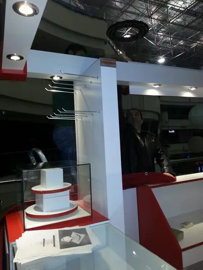 2E İletişim — Tekira AVM — mall kiosk — red gloss panels, backlit sign