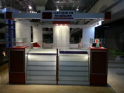 2E İletişim — Tekira AVM — mall kiosk — crown signage above the unit, maroon