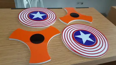 Fidget Spinner & Wax Hand — États-Unis — enseigne couronne au-dessus, bandeau LED en périphérie de socle (fabrication)