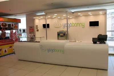Yogobonny — mall kiosk — back-of-counter prep area, recessed downlights