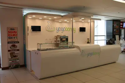 Yogobonny — mall kiosk — tempered glass display cases, recessed downlights