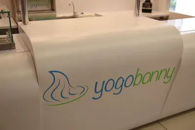 Yogobonny — mall kiosk — stainless steel, backlit sign